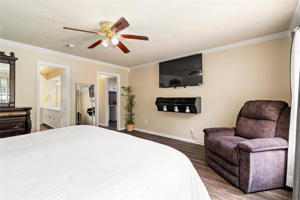 The primary suite offers plenty of room to stretch out, with direct access to the ensuite bath