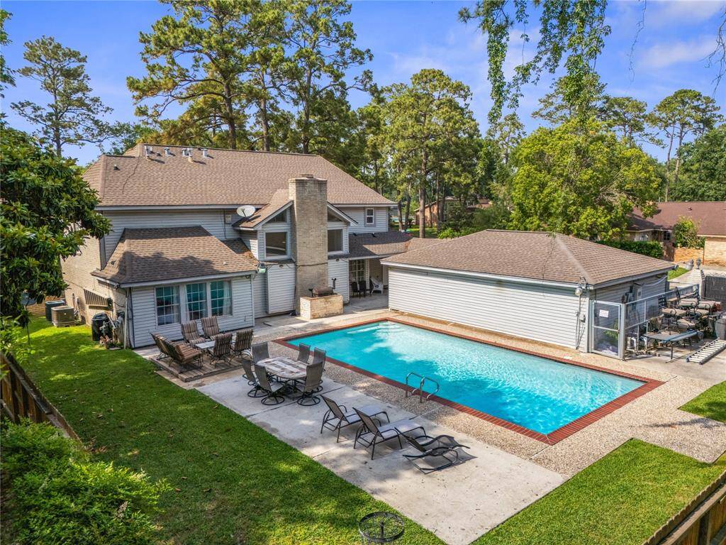 Everything you want outside — a full-size pool, space to hang out, and a yard that actually feels private.