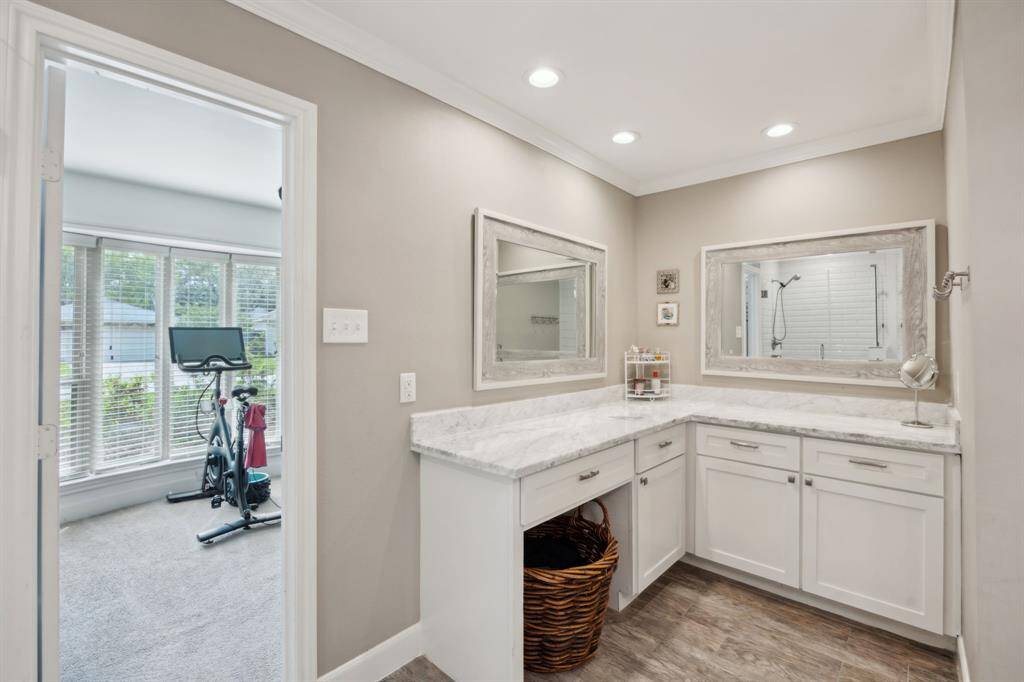 Another perspective of the primary bath showing the separate vanity area.
