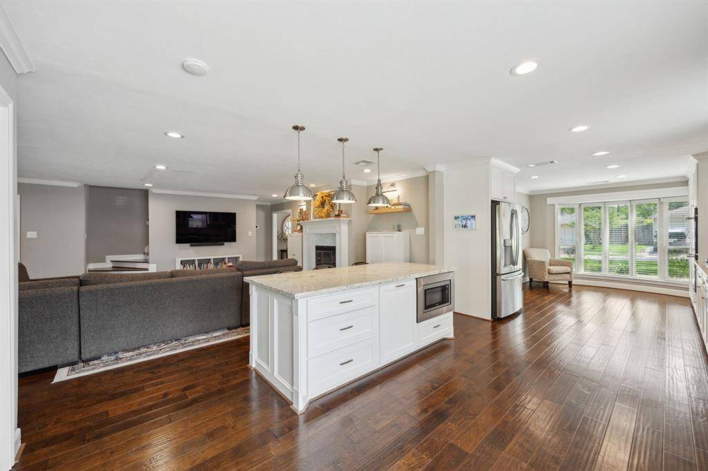 This view of the kitchen shows the expansiveness of the main living area.