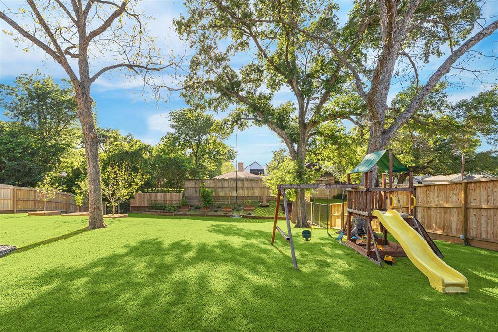 Sprawling backyard is fully fenced, providing you with peace of mind.