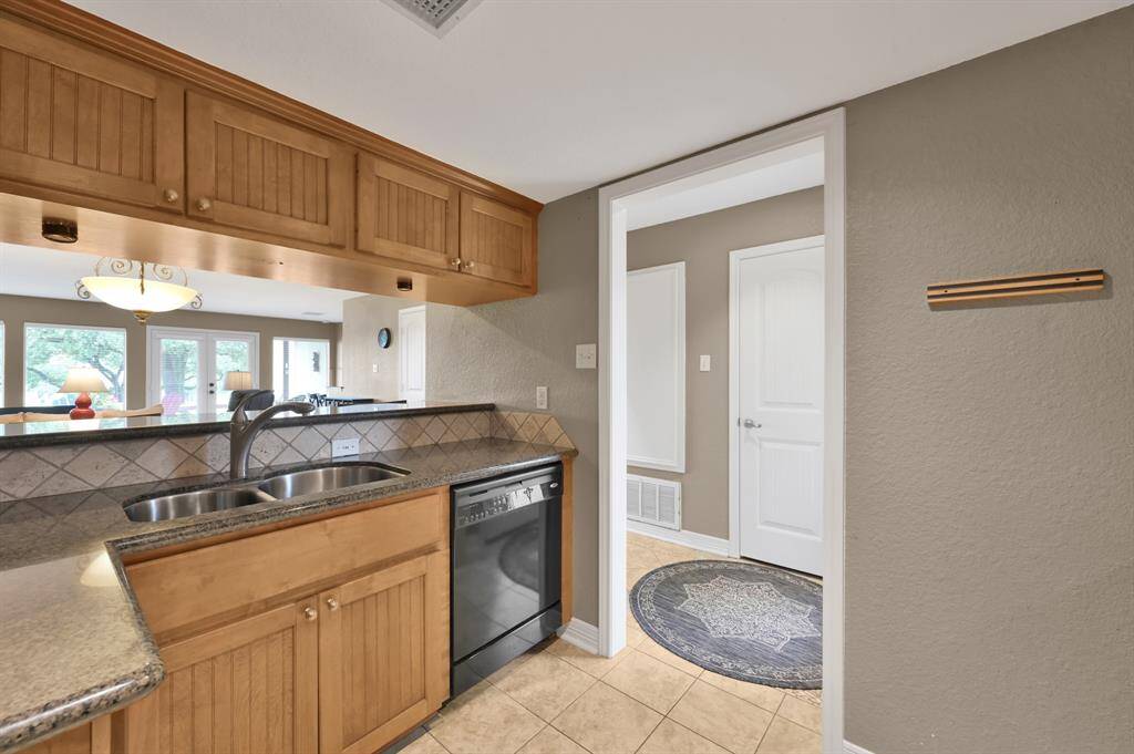 Kitchen located to the left of the entry. Walk in Pantry to the right of the entry.