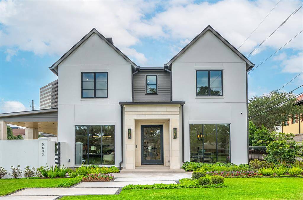 [Front Elevation]Inviting, Transitional-style residence custom built for the seller by Allen Edwards. Architectural design by Brickmoon Design, interiors by Benjamin Johnston Design.