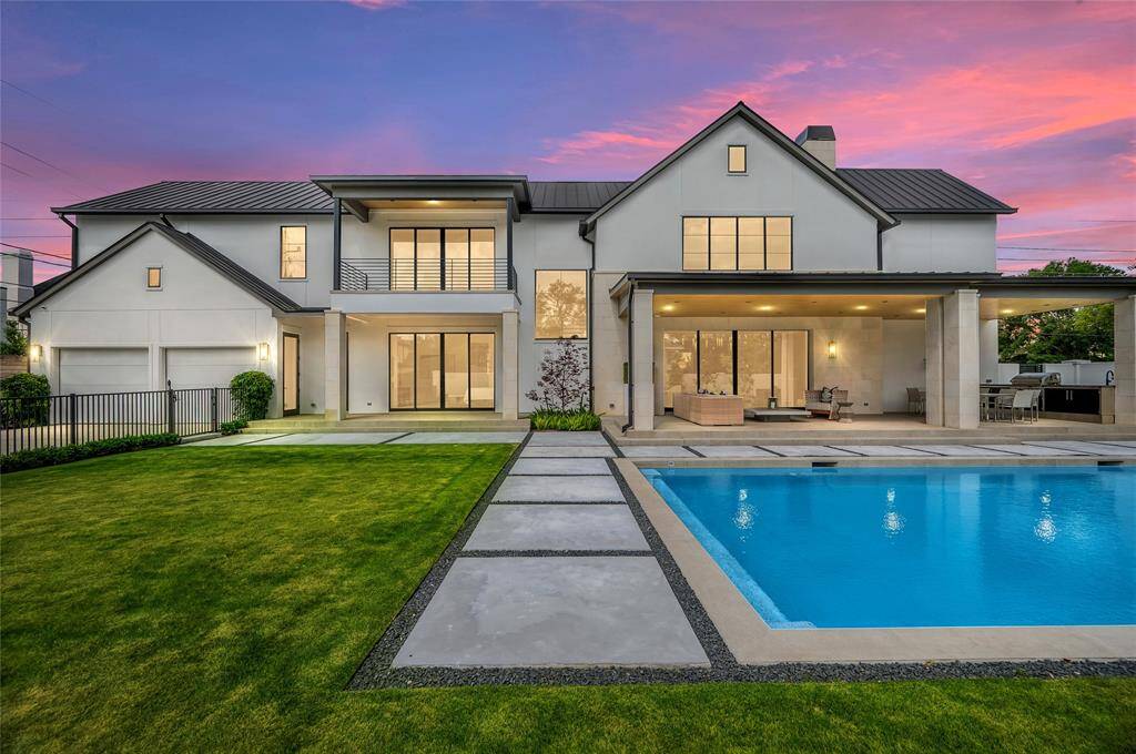 [Sheltered and Open Patios / Pool]The sheltered patio with summer kitchen enhances outdoor living and entertaining.
