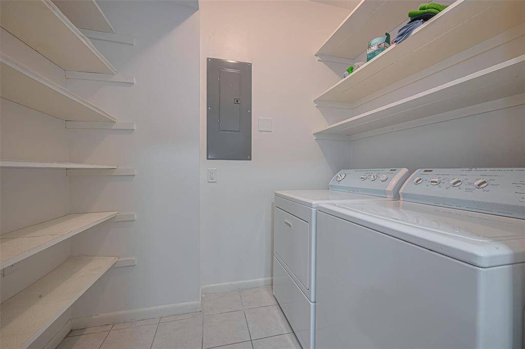 The utility room/pantry adds convenience and lots of storage. The washer and dryer are included!