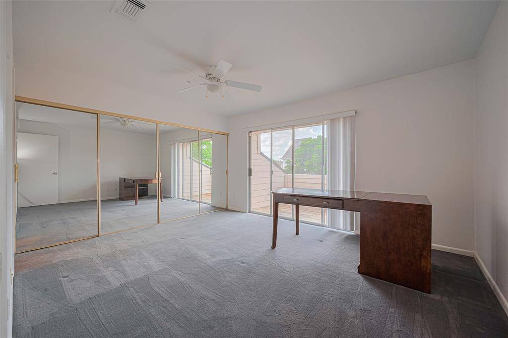 The spacious secondary bedroom comes with a private balcony which faces north (so no summer sun!).