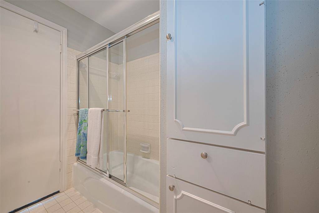 The secondary bedroom also features an ensuite bathroom.