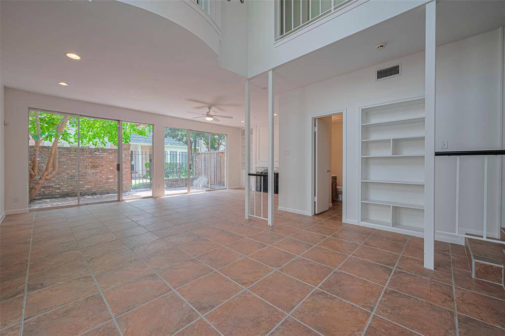 The dining room opens directly into the expansive living room.
