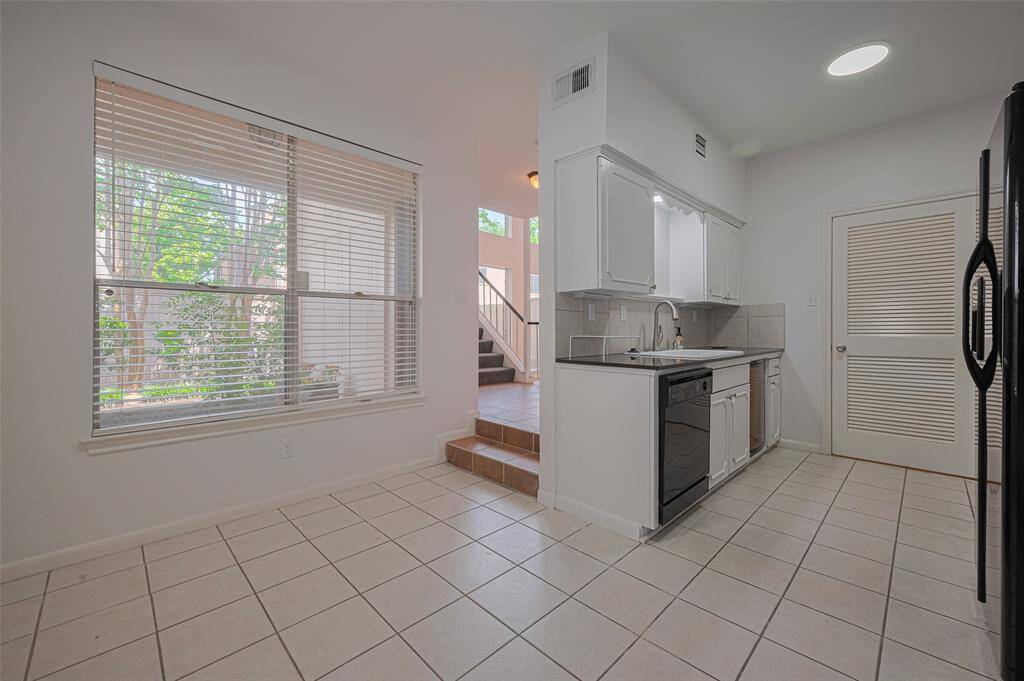 The galley kitchen is just steps from the dining room and features room for a breakfast area.