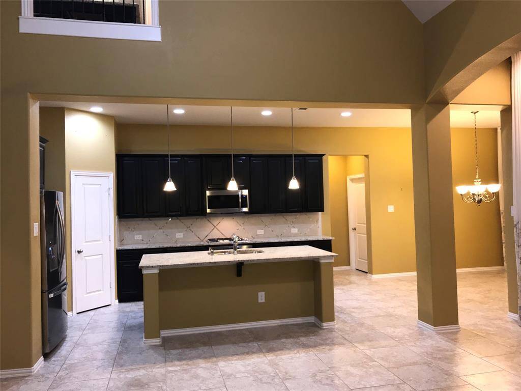 Great View of the beautiful Gourmet Kitchen with space for bar stools for additional seatings