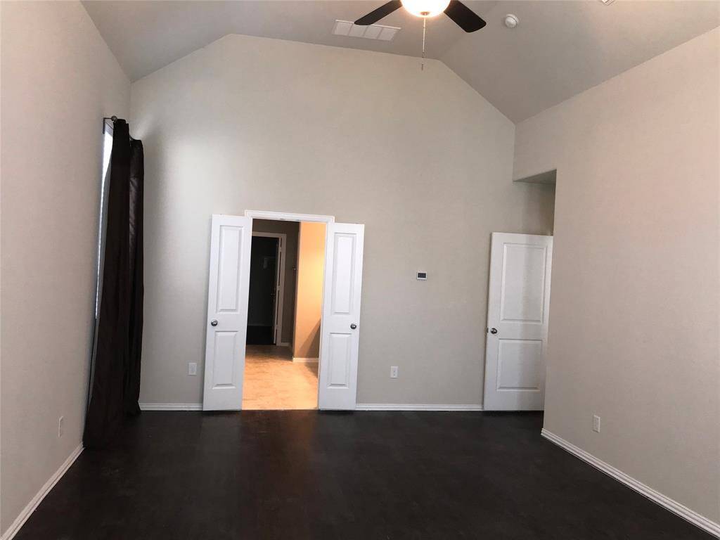 Large High Ceiling Primary Bedroom with lots of windows for abundant natural lights and large sitting areas (1 of 3)