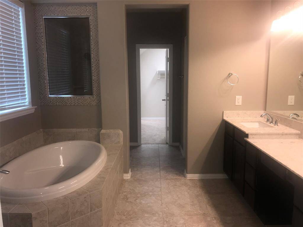 Separate Tub and Standing Shower in the Primary Bath