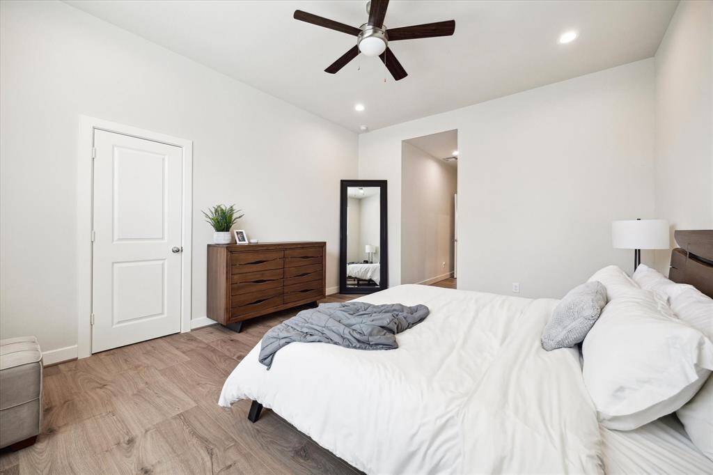Primary bathroom featuring dual sinks and a relaxing soaking tub — perfect for unwinding after a long day.