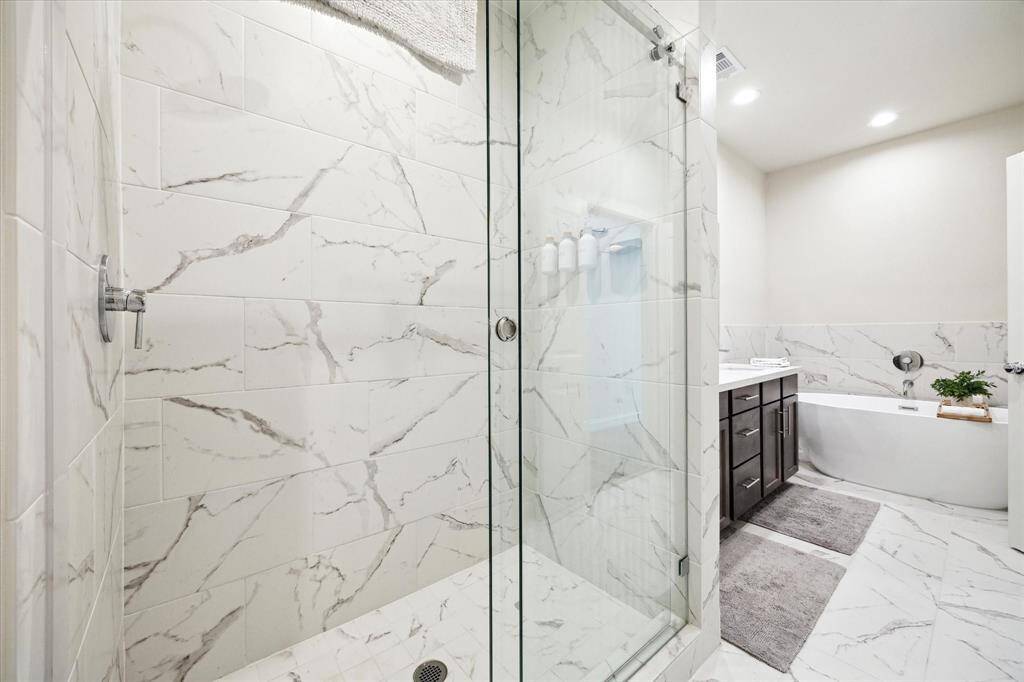 Spacious walk-in closet in the primary room, offering ample storage and organization space for all your essentials.