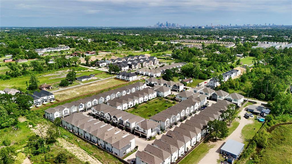 Another aerial view of the neighborhood, highlighting the peaceful surroundings and prime location.