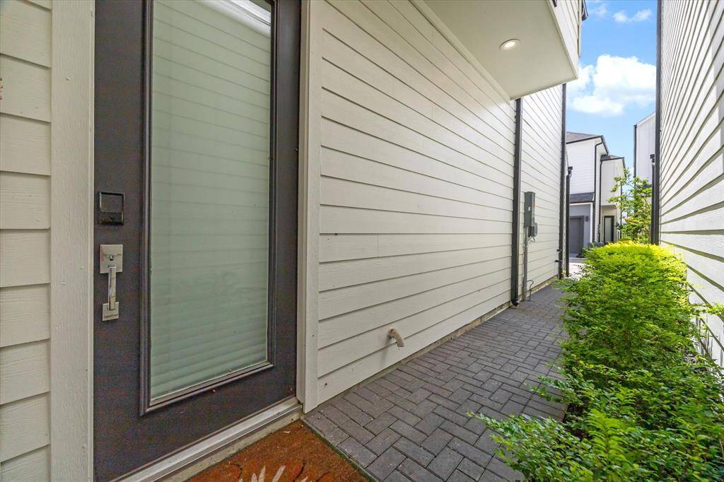 As you enter, you're greeted by a spacious living room and an open-concept kitchen — perfect for entertaining and everyday living.