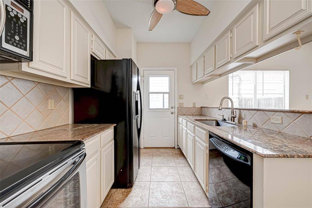 Kitchen with door to patio