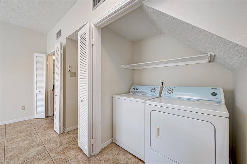 Washer and dryer stay