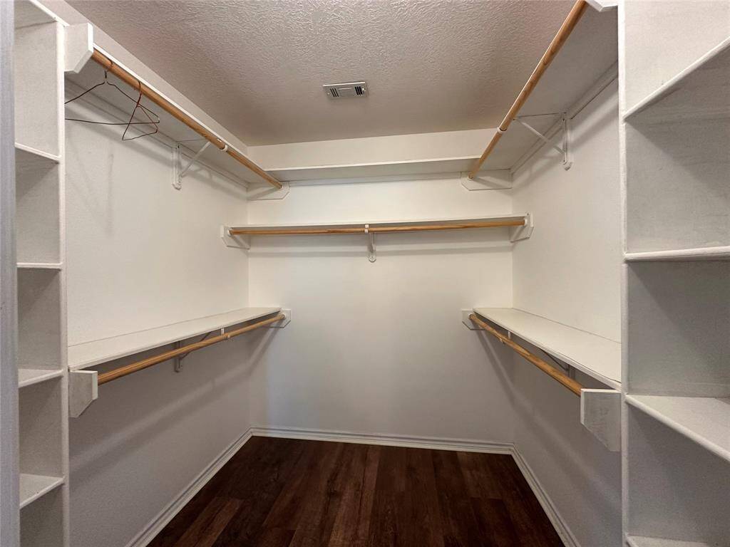 Walk-in closet with built-in shelving
