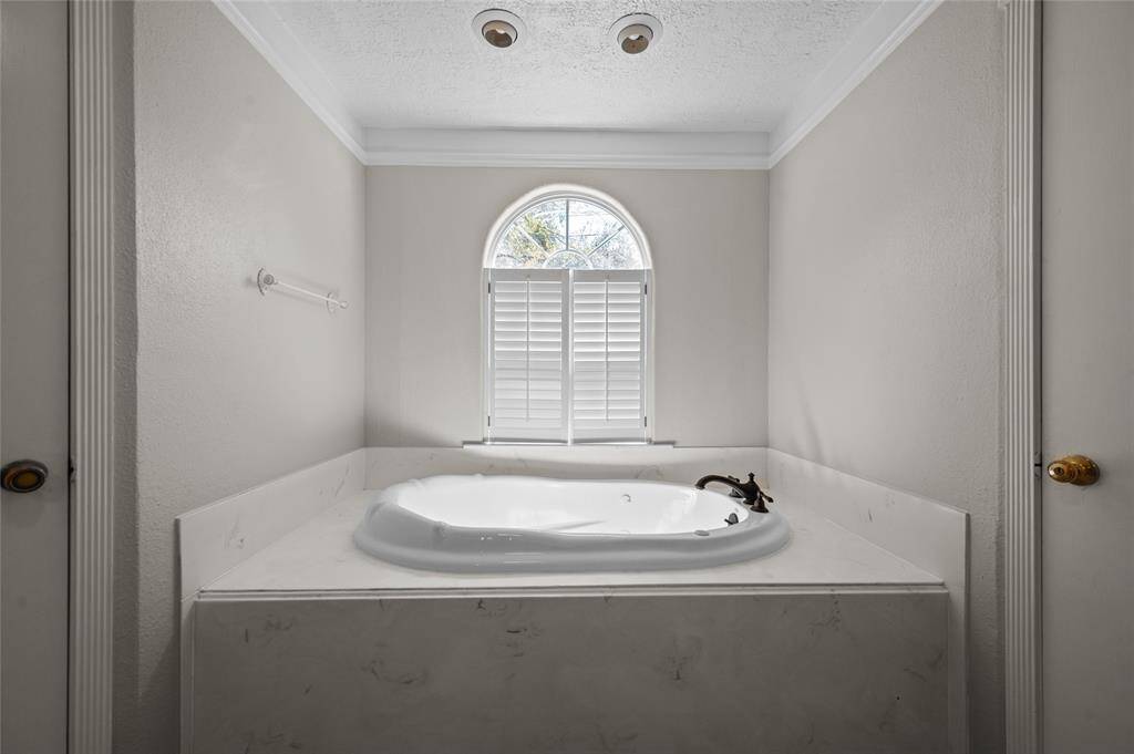 Primary bath with soaking tub.