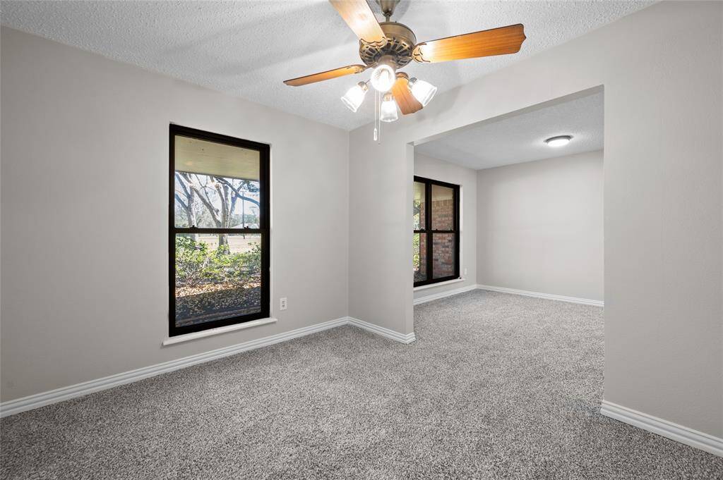 Bedroom #3 with a separate play or TV space.  This room would also make a great office/dining room.