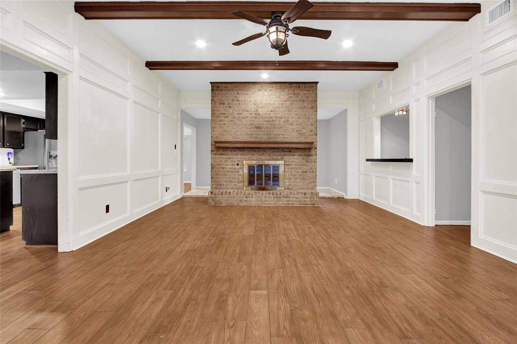 Discover the expansive elegance of this inviting den, perfect for relaxation or entertaining.