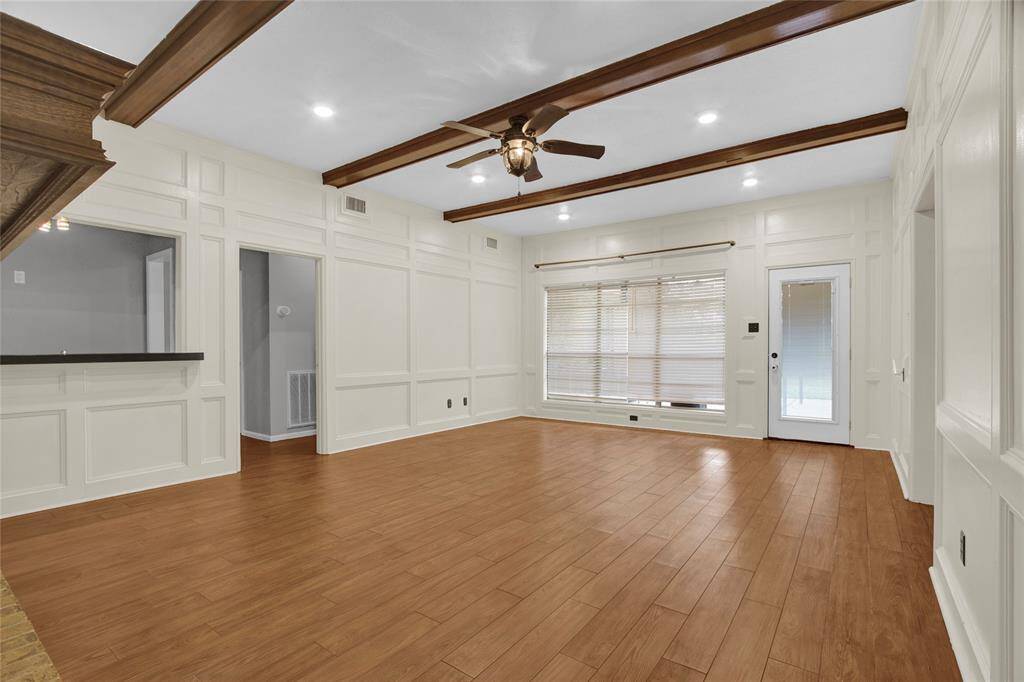 Entertain with ease in the den's sleek built-in wet bar.