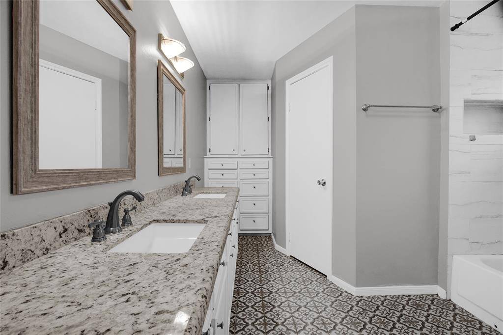 Ensuite Primary Bathroom with Dual Vanities and Designer Finishes