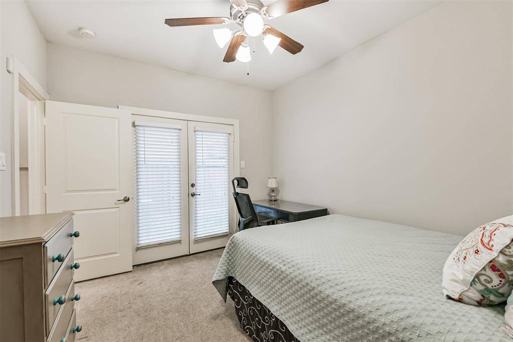 This bedroom would be the perfect office space and includes an en suite bathroom.