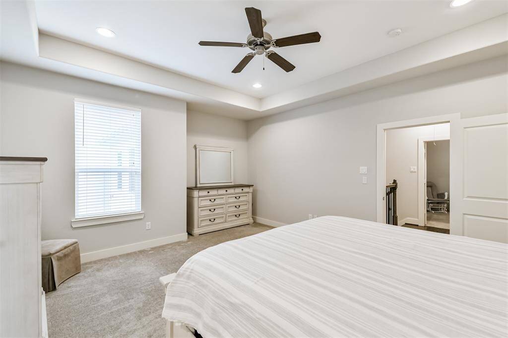 Another view of the primary bedroom.