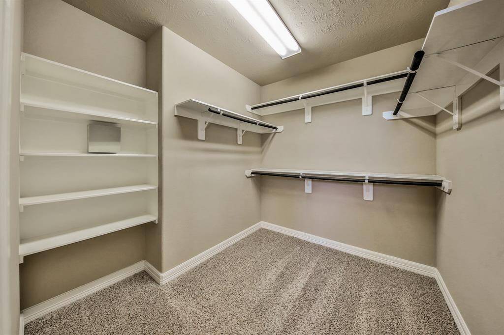The oversized walk-in closet in the owner's suite provides plenty of storage.