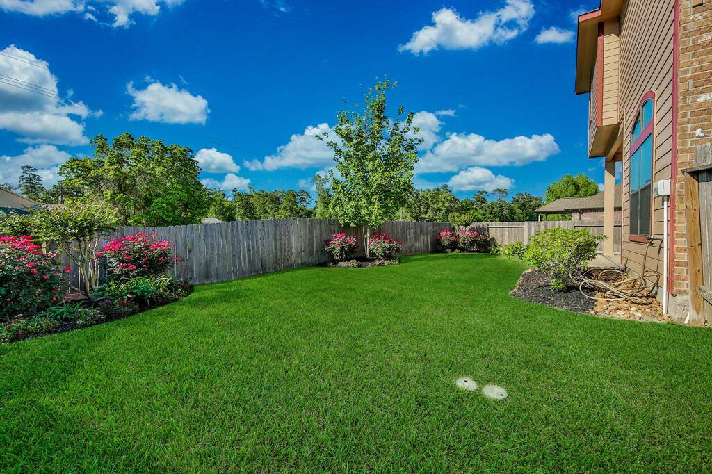 The adjacent greenbelt and no rear neighbors add to the privacy of this homesite.
