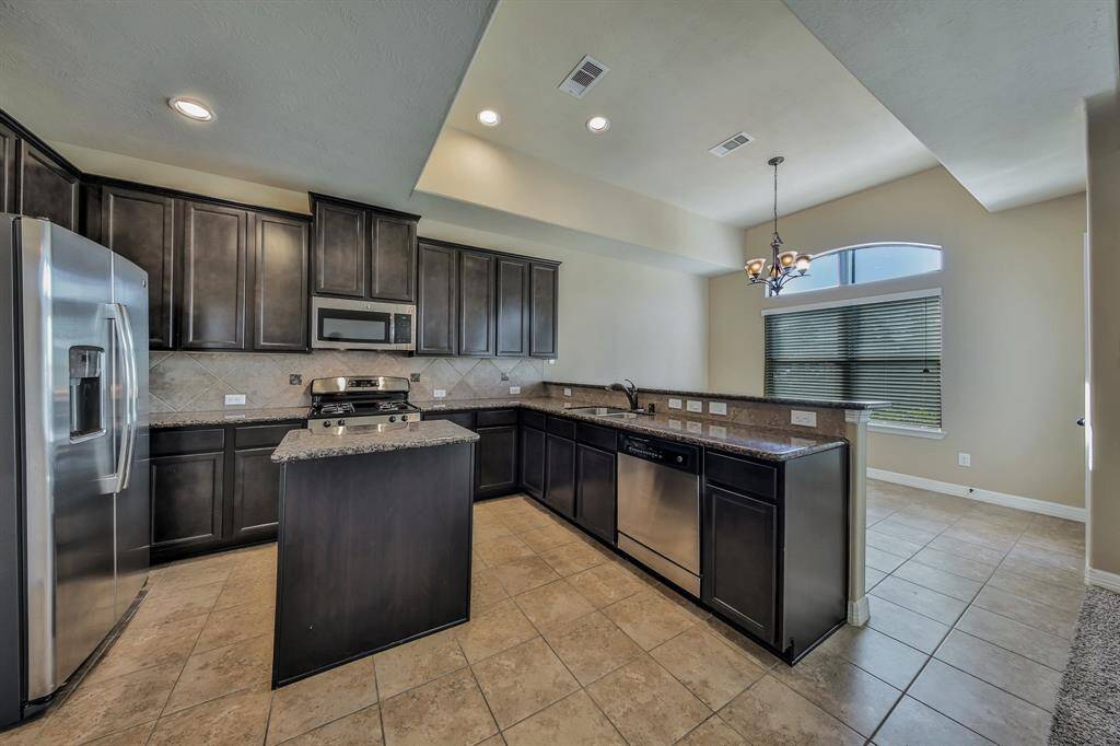 The family chef will love this kitchen with an abundance of cabinet and counter space.
