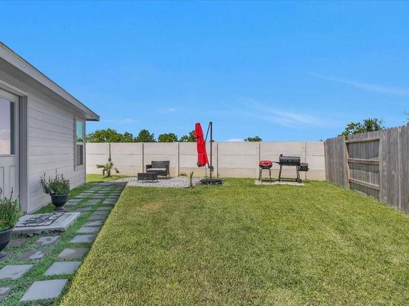 Come relax and enjoy this beautiful outdoor space, with no neighbors on the side for added privacy — perfect for unwinding or entertaining guests