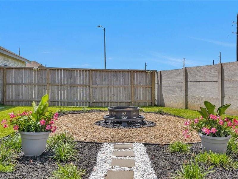 Enjoy beautiful landscaping that enhances your view, creating a serene and picturesque setting right outside your door.