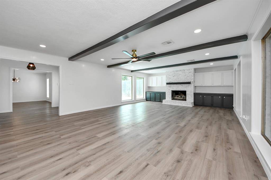 The seamless flow into the formal dining room makes it ideal for both relaxing and entertaining.