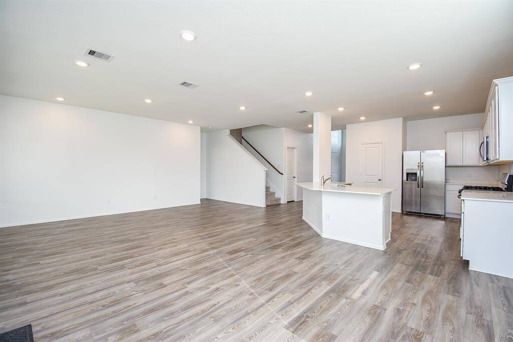 The breakfast room seamlessly integrates with the open kitchen and living area.