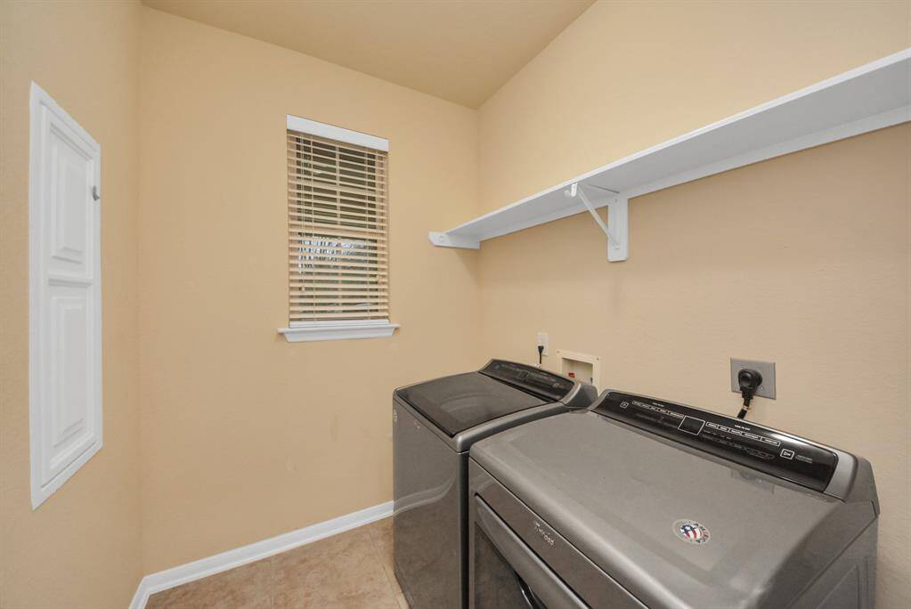Utility closet that comes with washer and dryer included!