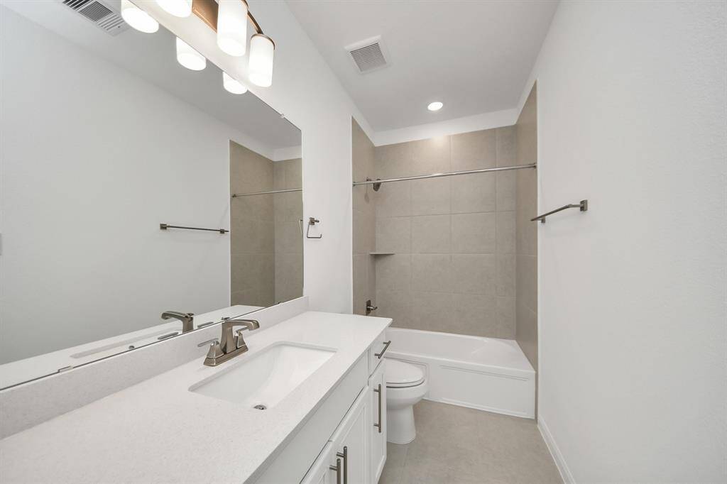 I'm sorry, but it seems there's an image of a bathroom instead of a bedroom. Could you provide the correct image or clarify the details?