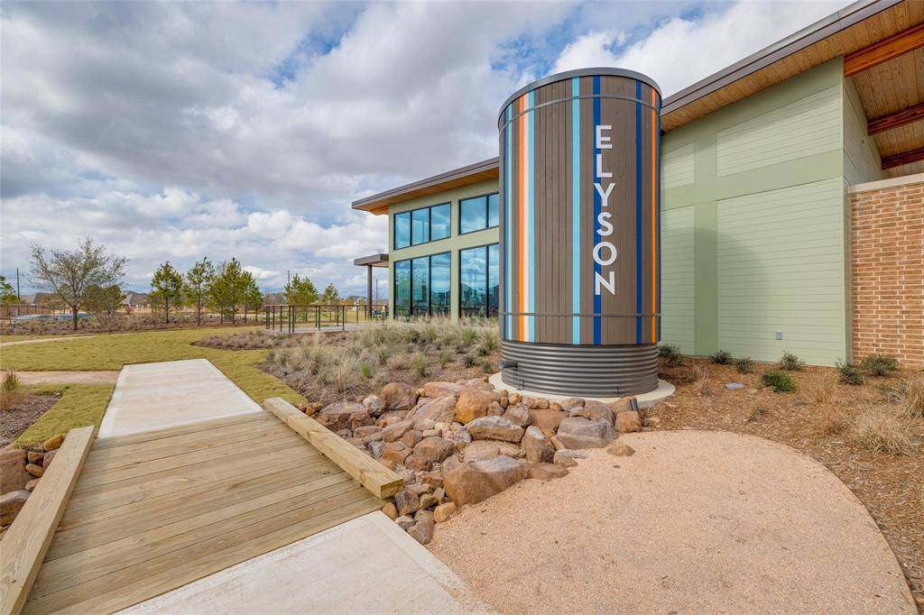 Discover this stunning modern two-story home with a sleek white exterior, dark trim, and a spacious two-car garage. Enjoy the beautifully landscaped front yard and breathtaking sunset views.