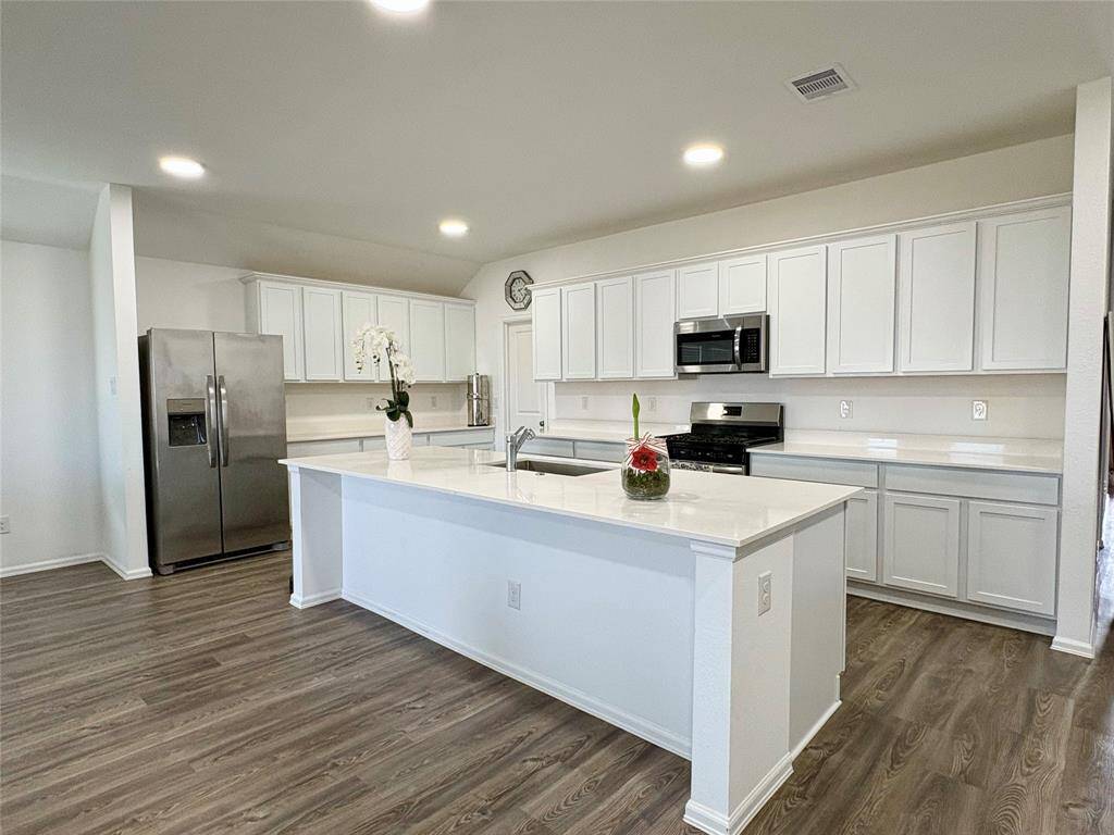 Beautiful kitchen with lots of counter space and cabinets