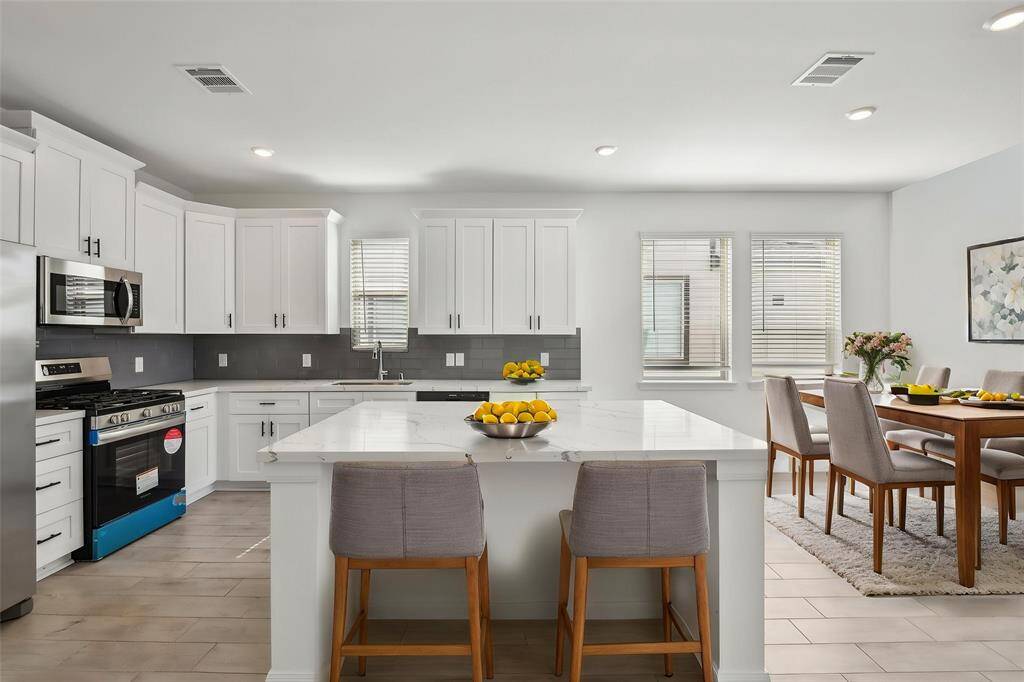 This kitchen is truly the heart of the home, ready for you to create delicious memories.