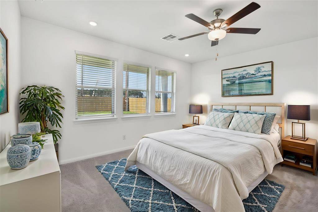 Retreat to the serene and spacious primary bedroom.