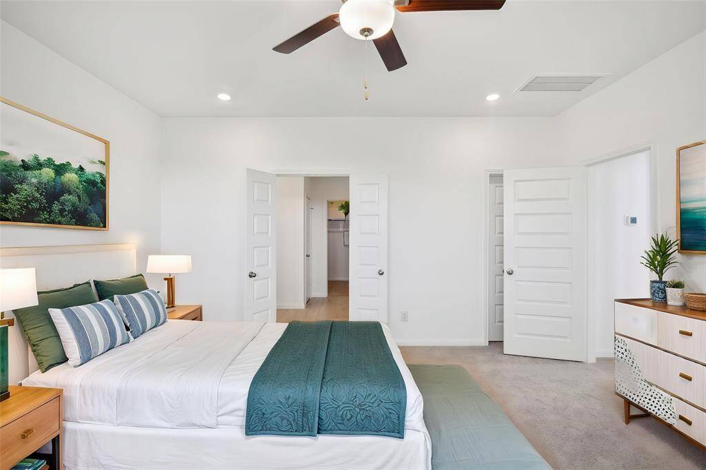 Notice the soft, neutral, carpeting underfoot, creating a cozy and inviting atmosphere.