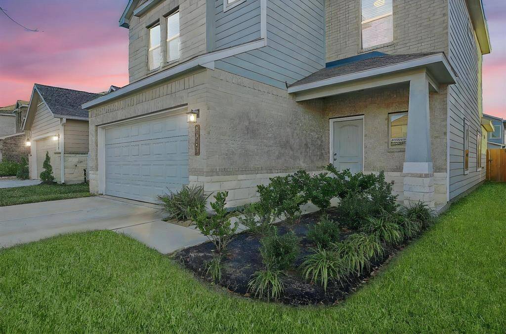 Notice the gorgeous curb appeal especially the walkway to the door.