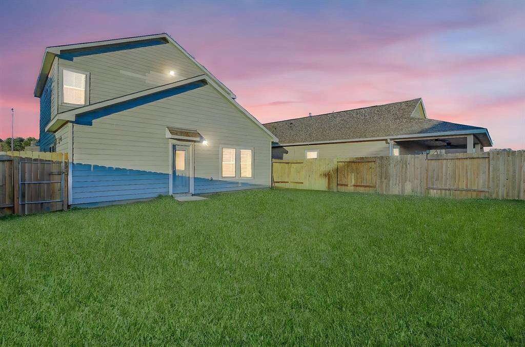 This yard is fully fenced that offers privacy to enjoy the nature or host family gatherings.