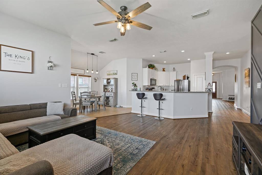 Experience the seamless flow and practicality of this open-concept floor plan, ideal for modern living.