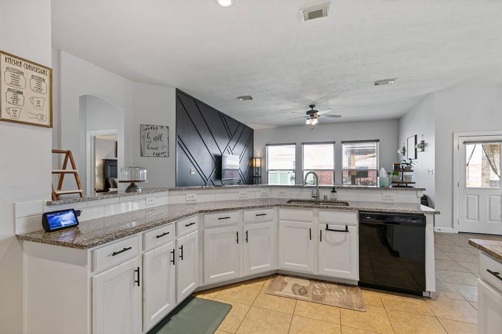 Enjoy effortless entertaining in this inviting family room view.