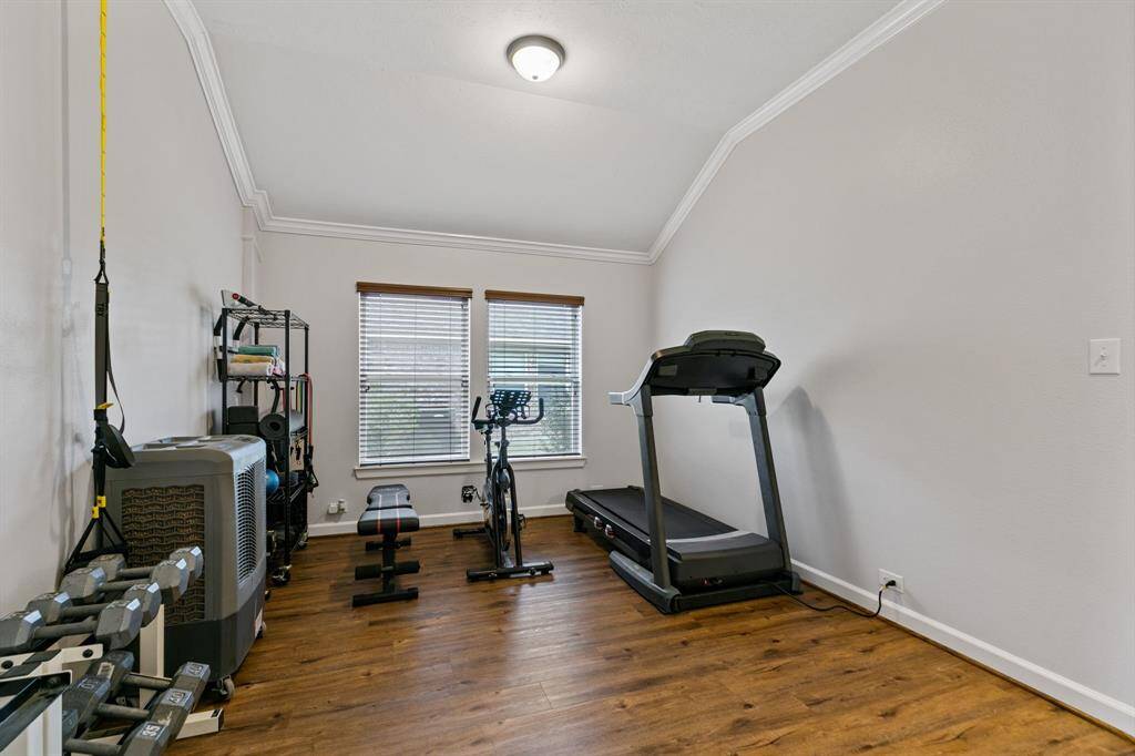 Discover endless possibilities in this adaptable room—perfect as a home gym or customized to fit your needs.