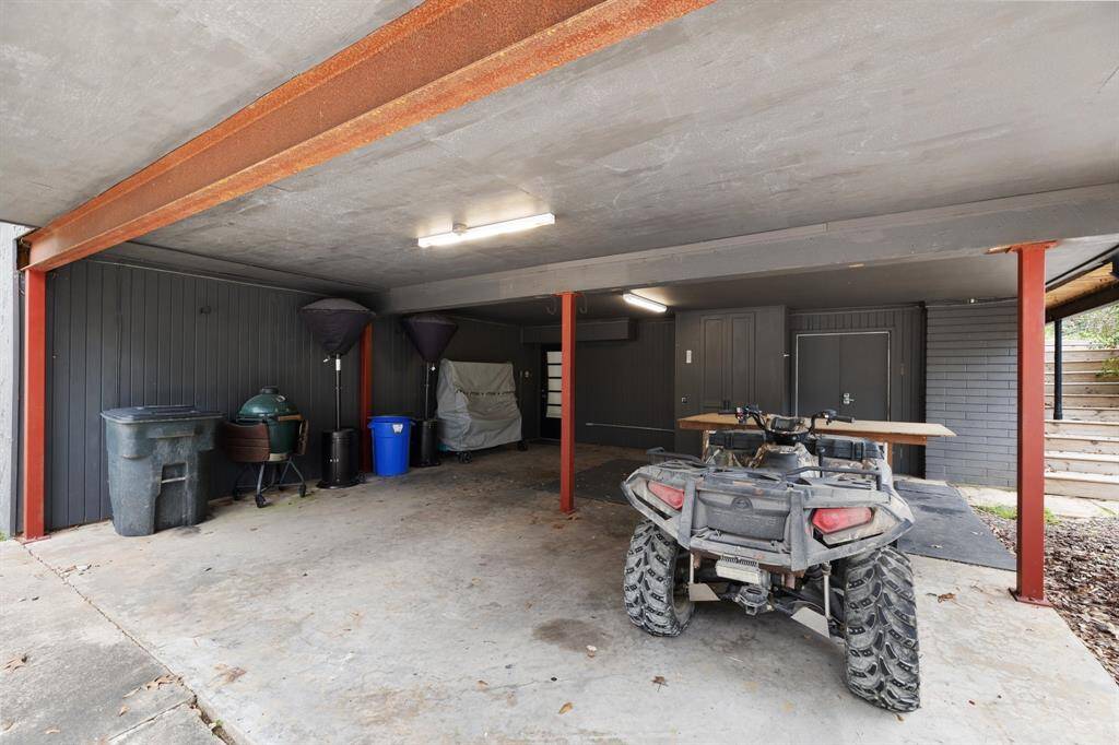 carport with direct access to your shop/storage area and the home.